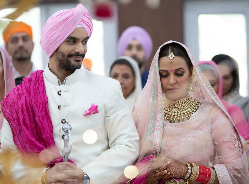 Neha Dhupia and Angad Bedi marry each other